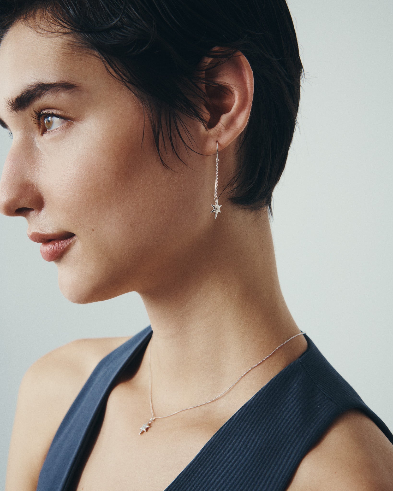Electra Earrings and Electra Necklace in Silver, worn