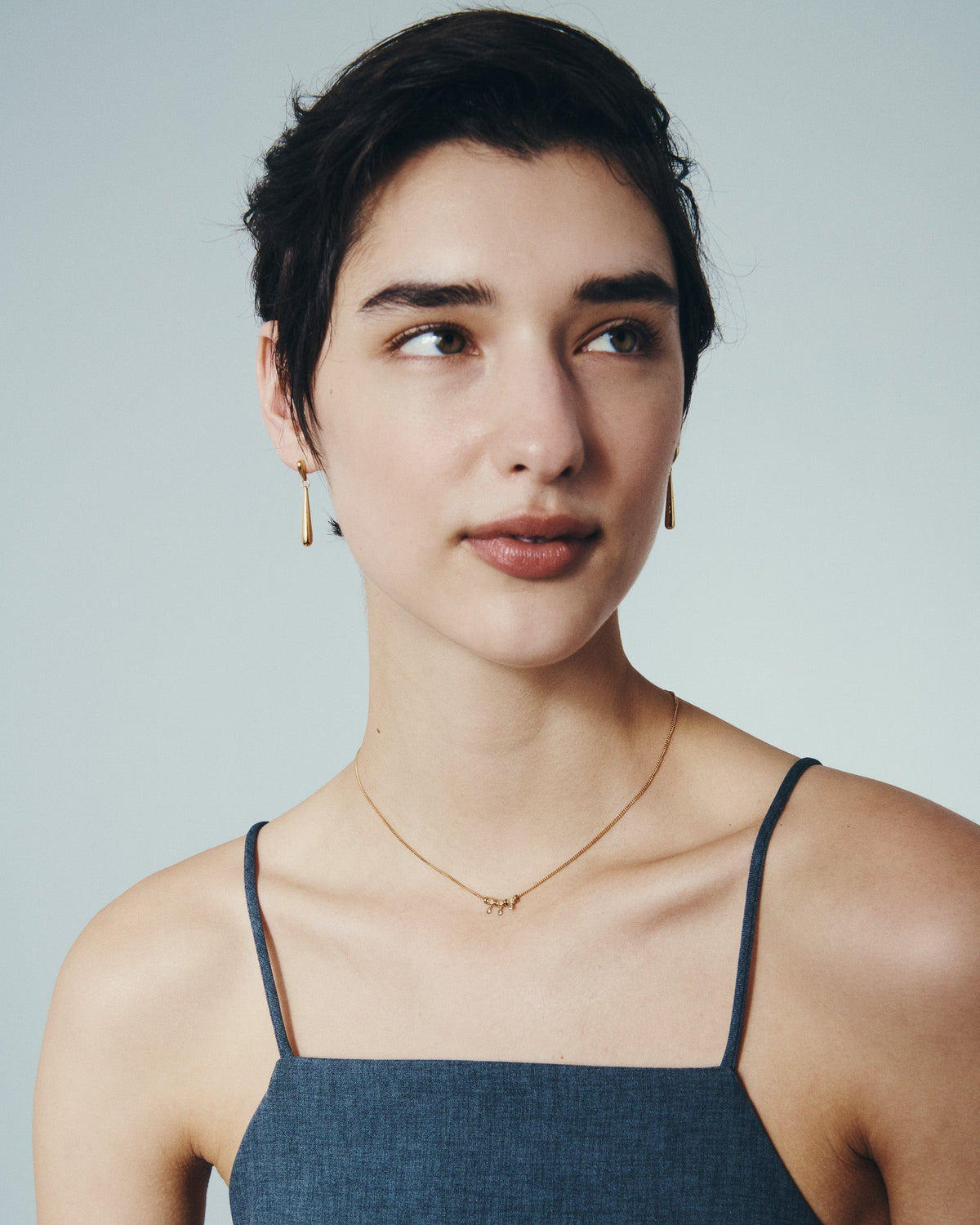 Isla Necklace and Stilla Earrings in Gold Vermeil, worn