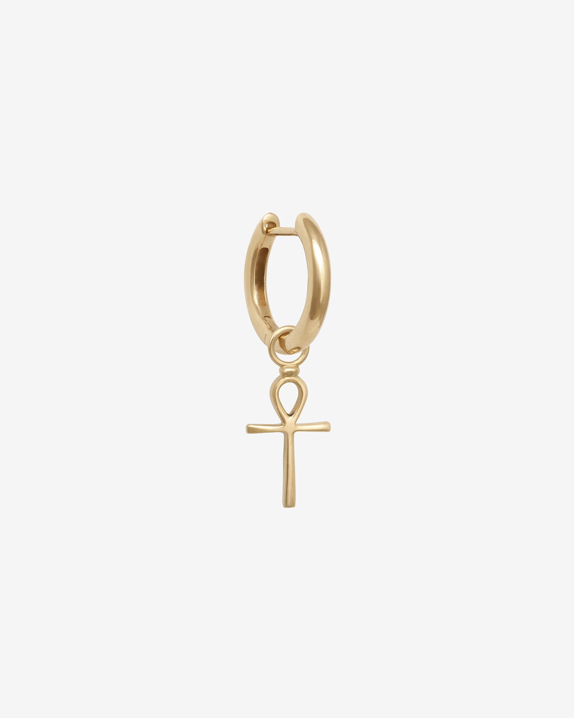 Gold hoop earring with an Ankh charm on a white background