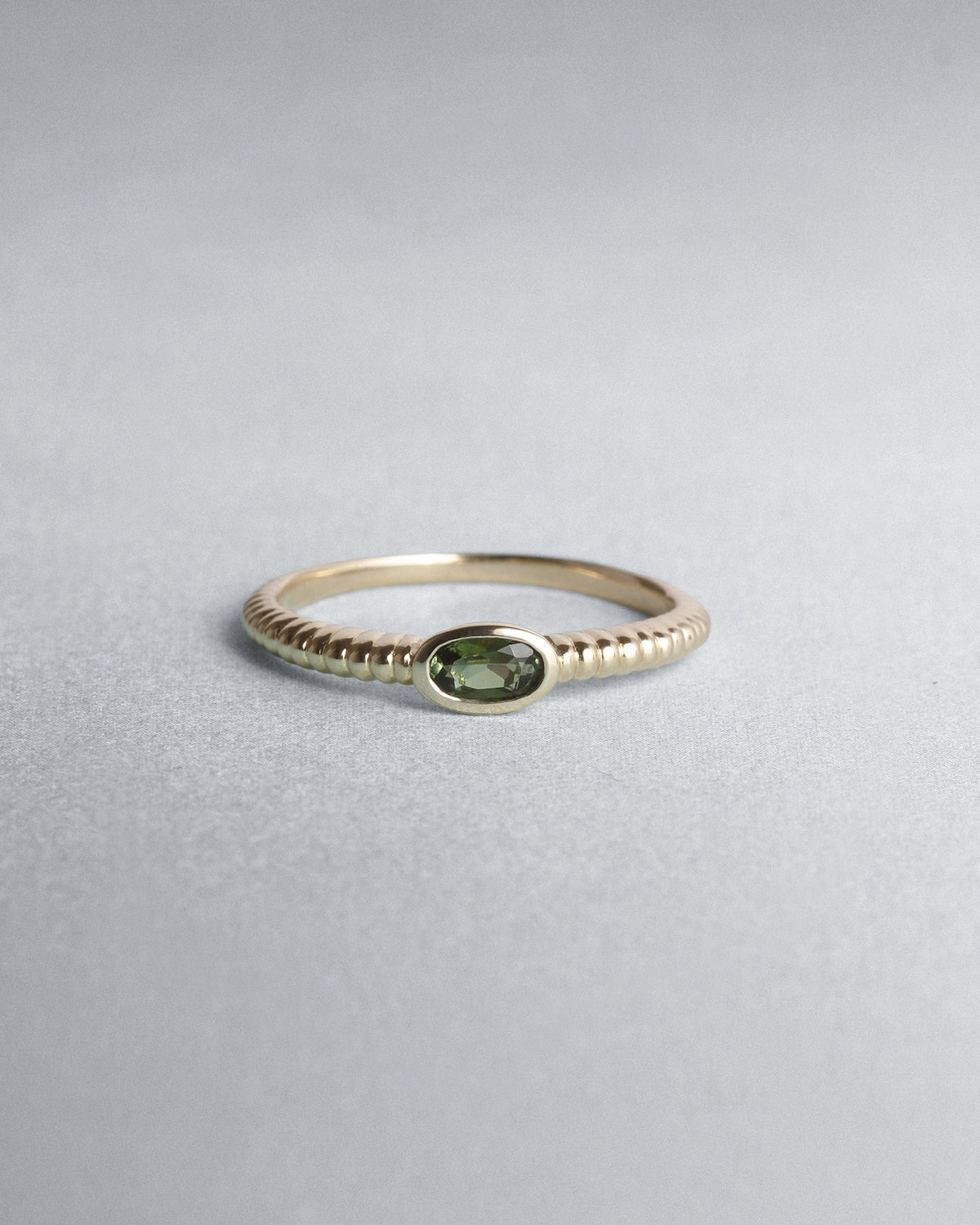 Wren Green Tourmaline Solitaire Ring Solid Gold, flatlay