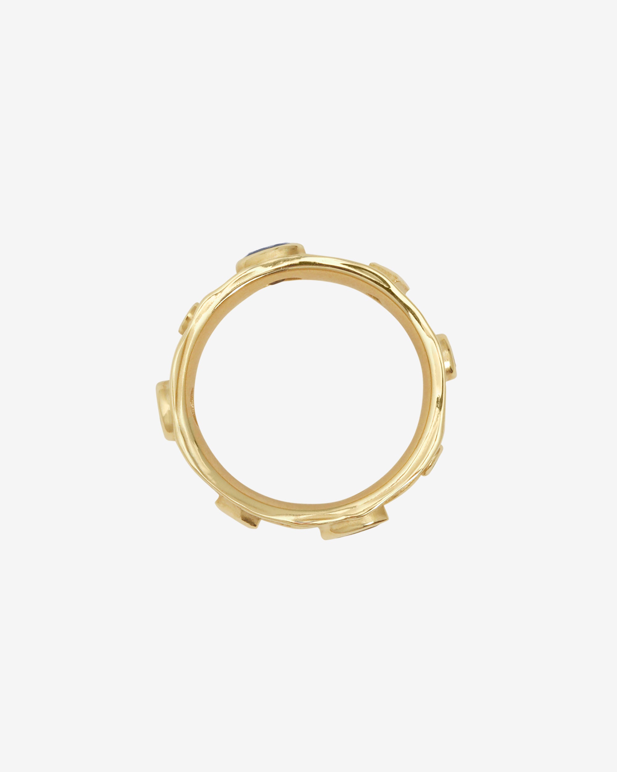 Gold ring on a white background