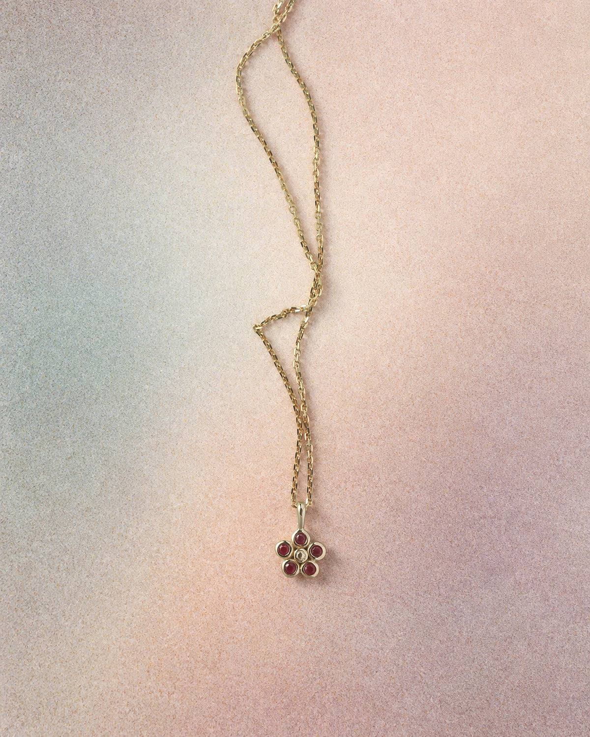Daisy Ruby Necklace Solid Gold, flatlay