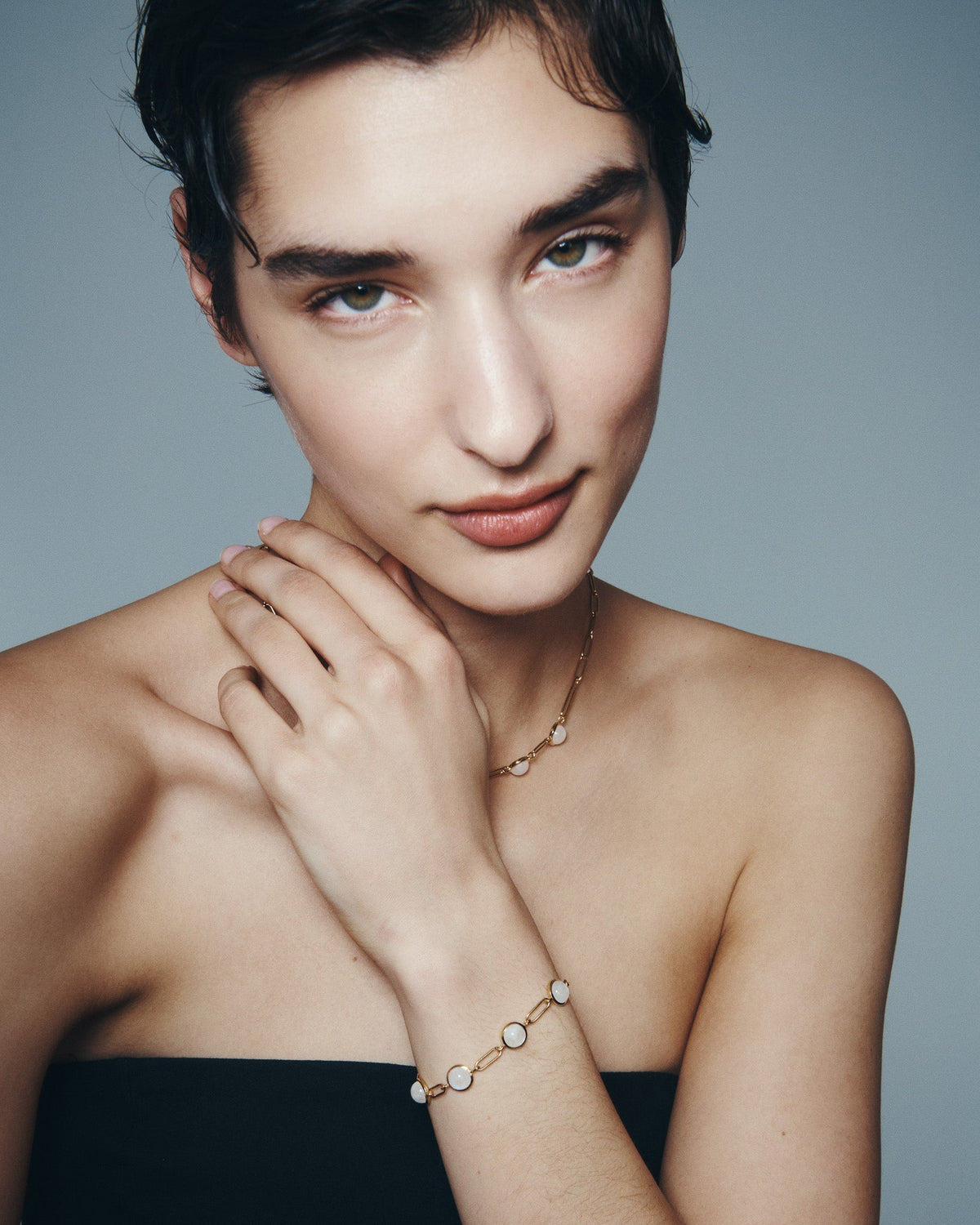 Lumi Necklace and Lumi Bracelet in Gold Vermeil, worn