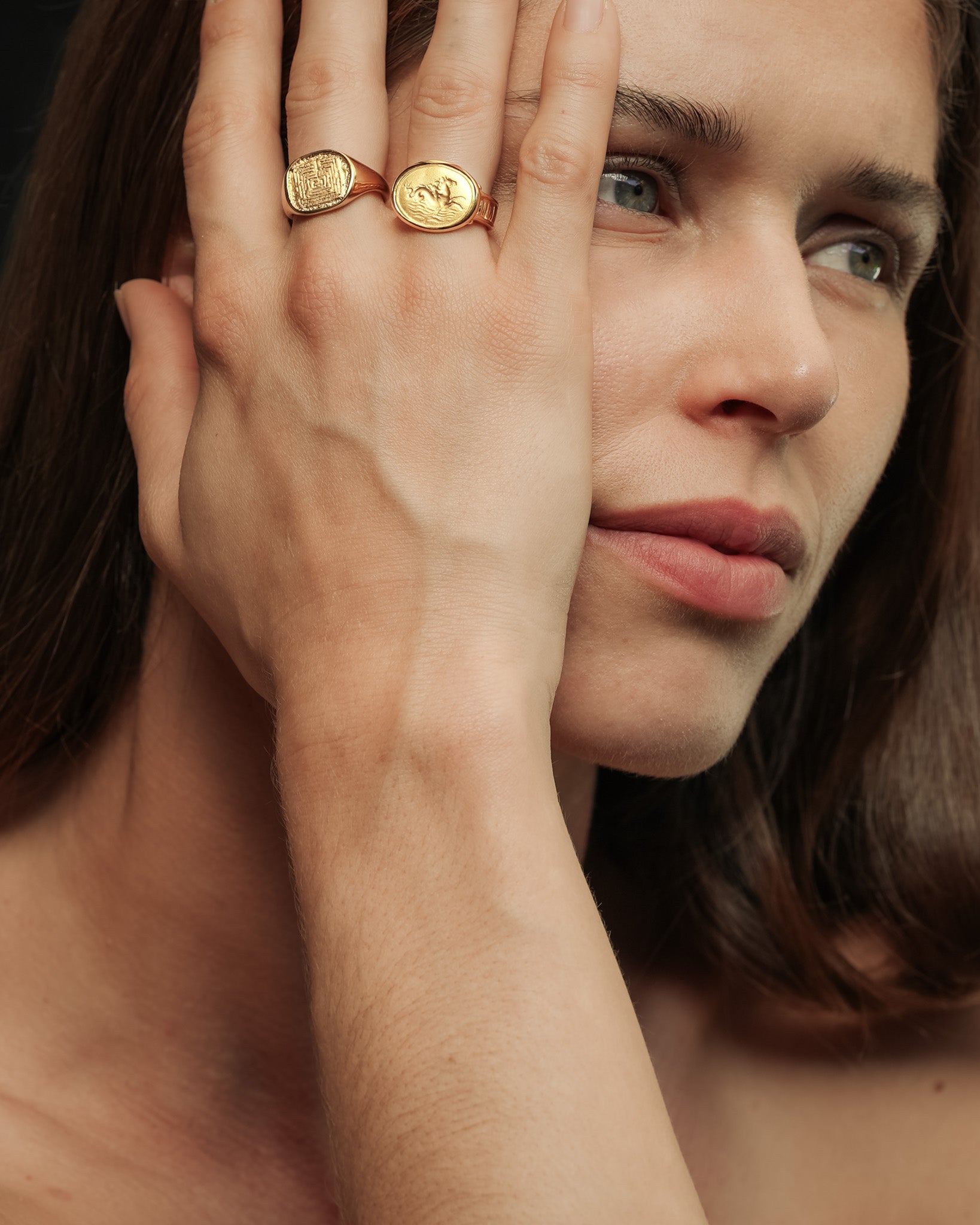 Woman wearing Poseidon Ring Gold. Vermeil