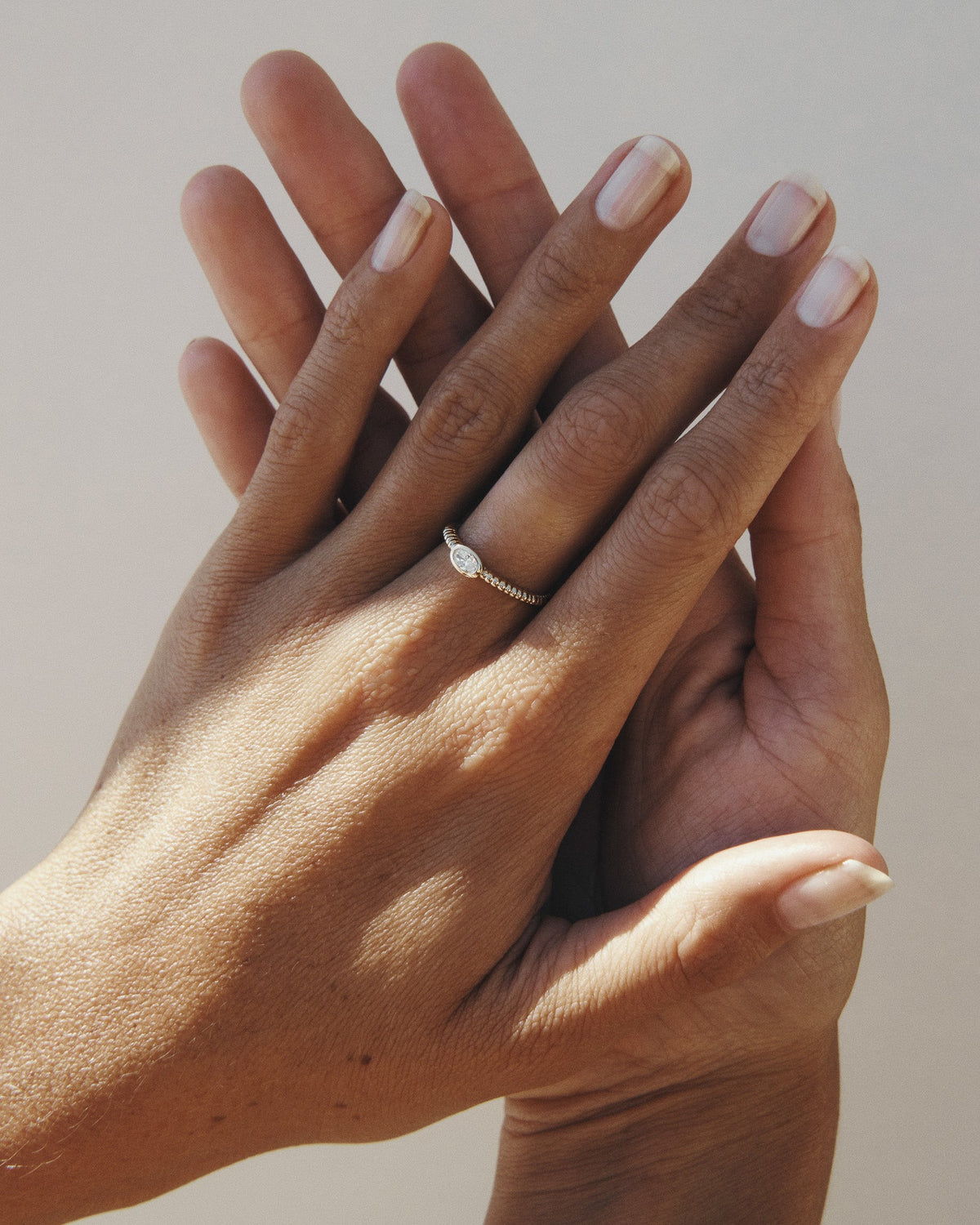 Wren Diamond Solitaire Ring Solid Gold, worn on the hand