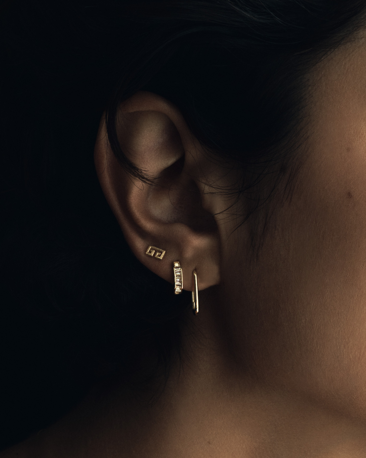 Temple of the Sun Jewellery Tapered Baguette Single Huggie White Topaz Solid Gold